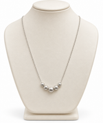 Collana in Oro Bianco con Cinque Sfere Diamantate – 45 cm
