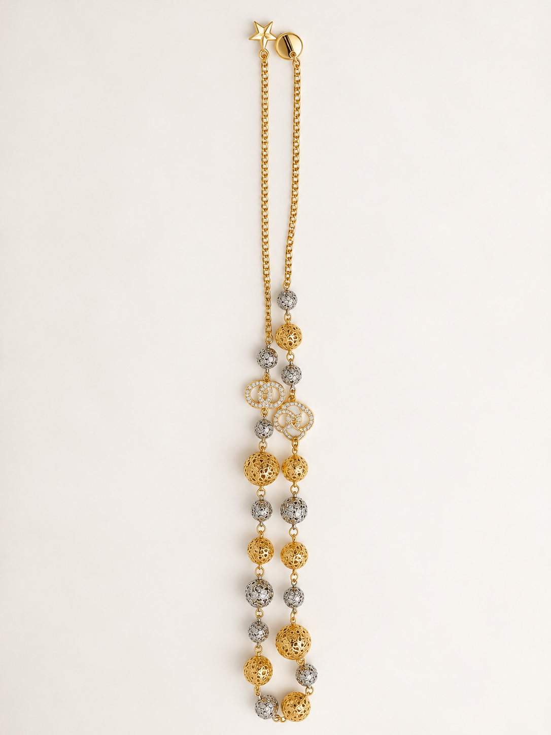 Collana Lunga Bicolore con Sfere Traforate e Punti Luce