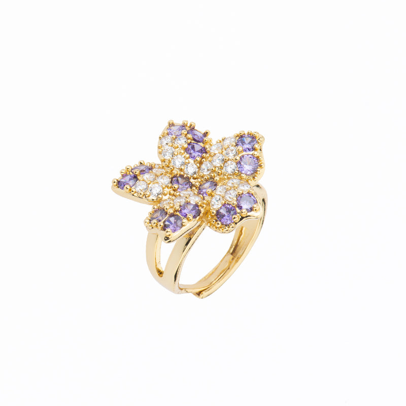 Anello con top in brass dorato a forma di fiore in pavè di zirconi bicolore violet e clear