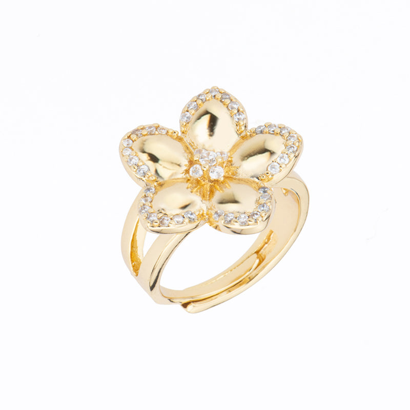 Anello top in brass dorato a forma di fiore a 5 petali con zirconi clear - misura regolabile