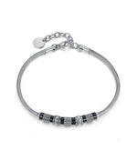 BRACCIALE IN ACCIAIO CON ELEMENTI IN IP NERO ANTICATO