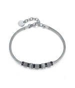 BRACCIALE IN ACCIAIO CON ELEMENTI IN IP NERO ANTICATO