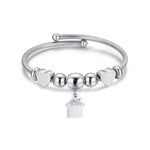 BRACCIALE IN ACCIAIO CON CASA CON CRISTALLI BIANCHI E CUORI ACCIAIO