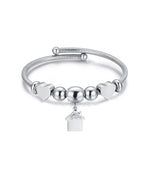 BRACCIALE IN ACCIAIO CON CASA CON CRISTALLI BIANCHI E CUORI ACCIAIO