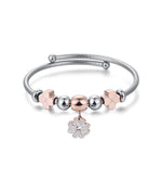 BRACCIALE IN ACCIAIO CON QUADRIFOGLIO IP ROSE CON CRISTALLI BIANCHI