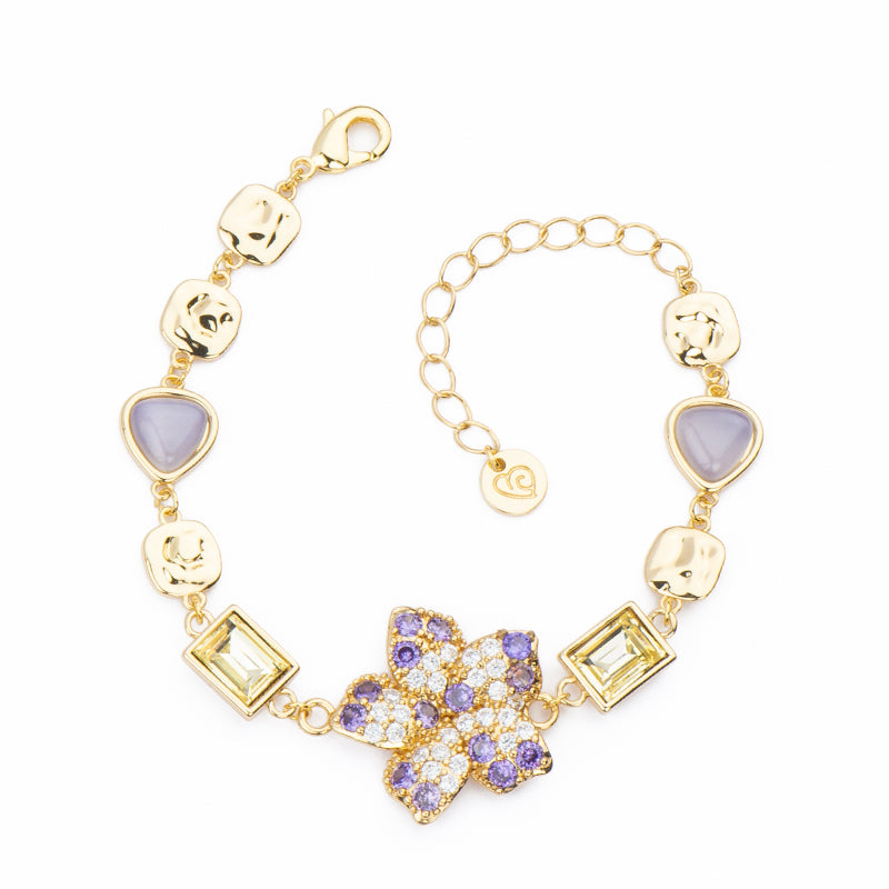 Bracciale con centrale a fiore in brass dorato in pavè di zirconi bicolore violet e clear cristalli citrino e cat eye ametista - Misura Regolabile