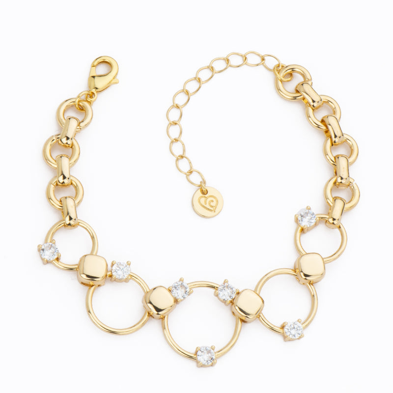 Bracciale catena in brass dorato assemblata a mano con anelli multi dimensione e punti luce in zirconi clear  - Misura Regolabile