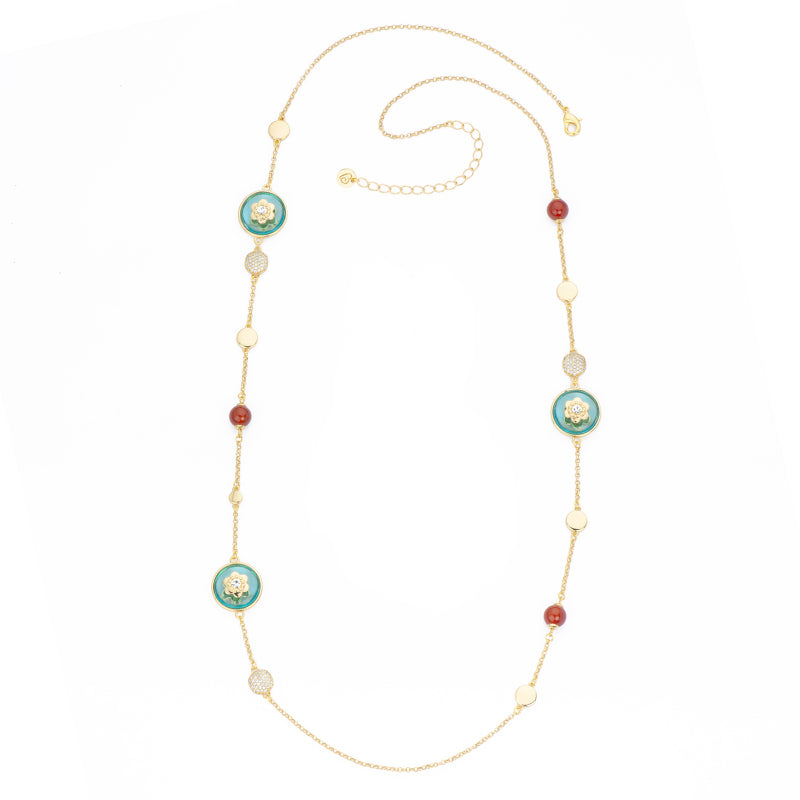 Collana catenina intervallata da elementi in brass dorato lisci e in pavè di zirconi con pietre red agata e bottoni in cristallo azzurro - misura regolabile