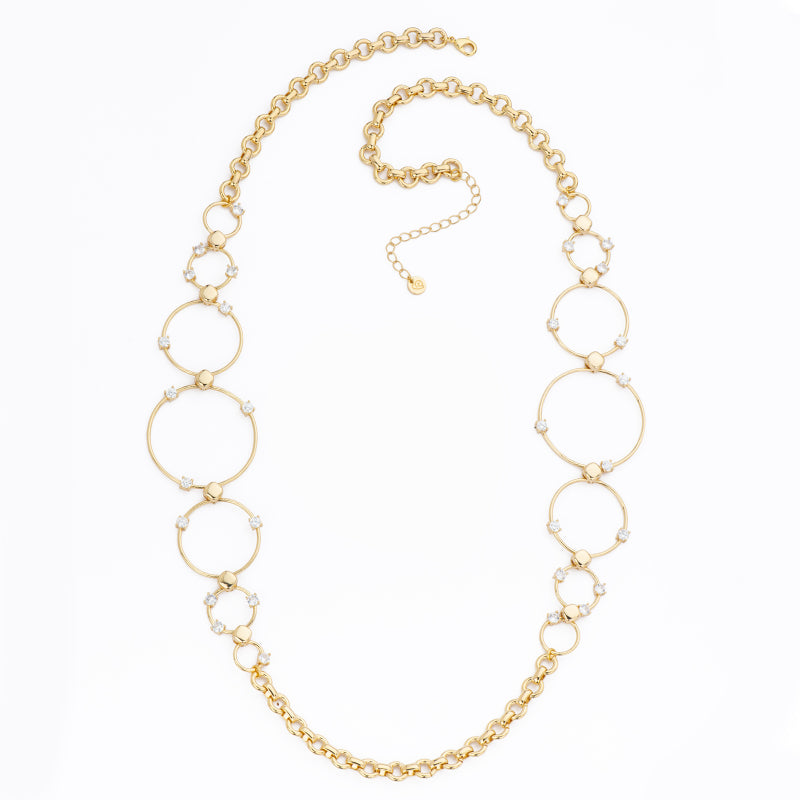 Collana catena in brass dorato assemblata a mano con anelli multi dimensione e punti luce in zirconi clear - Misura regolabile