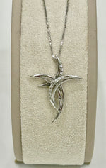 Collana con croce in oro 18kt e brillanti