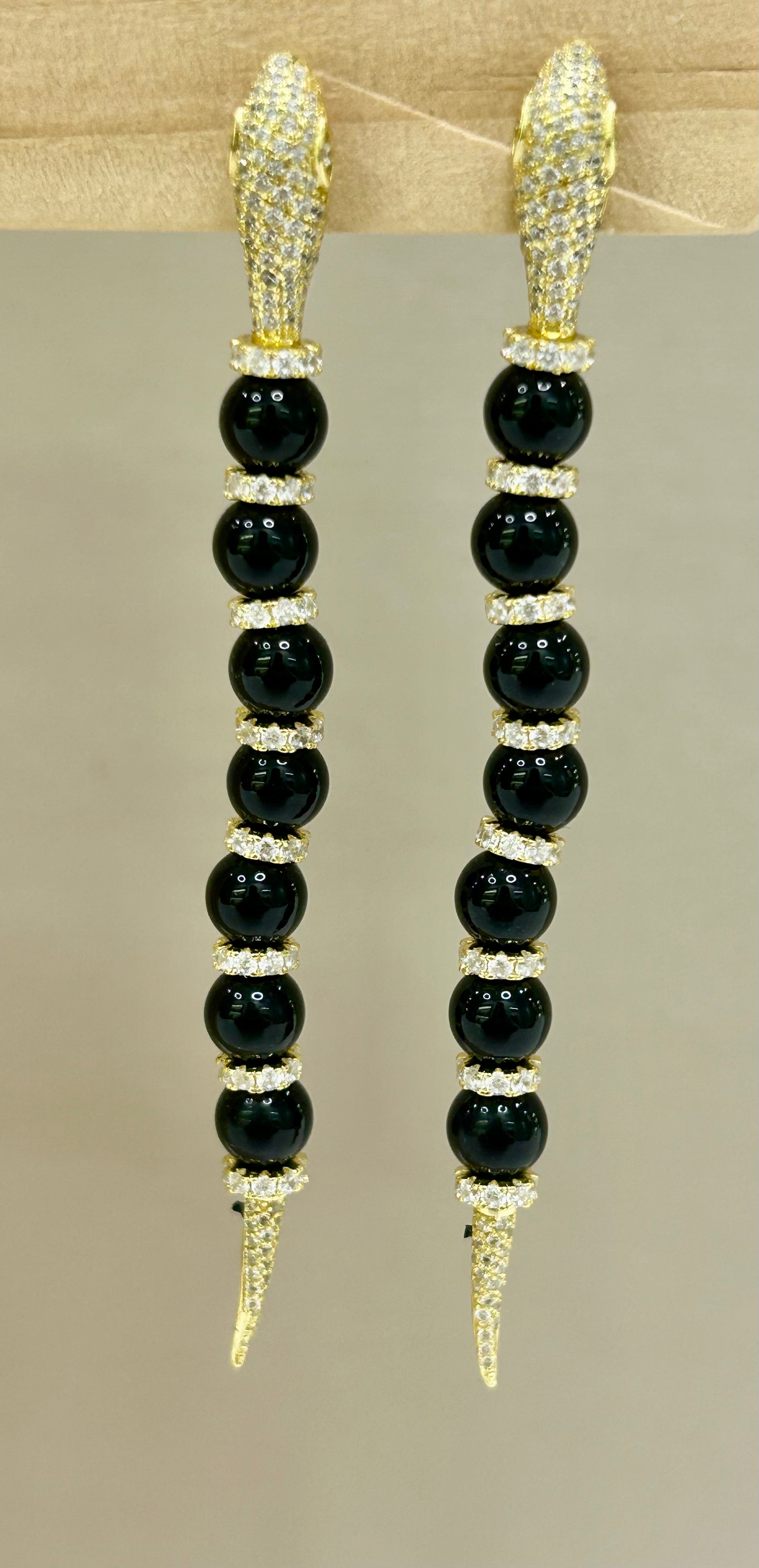 Orecchini modello Cartier in argento dorato 925% e onice nero