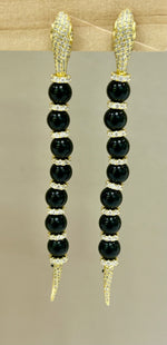 Orecchini modello Cartier in argento dorato 925% e onice nero