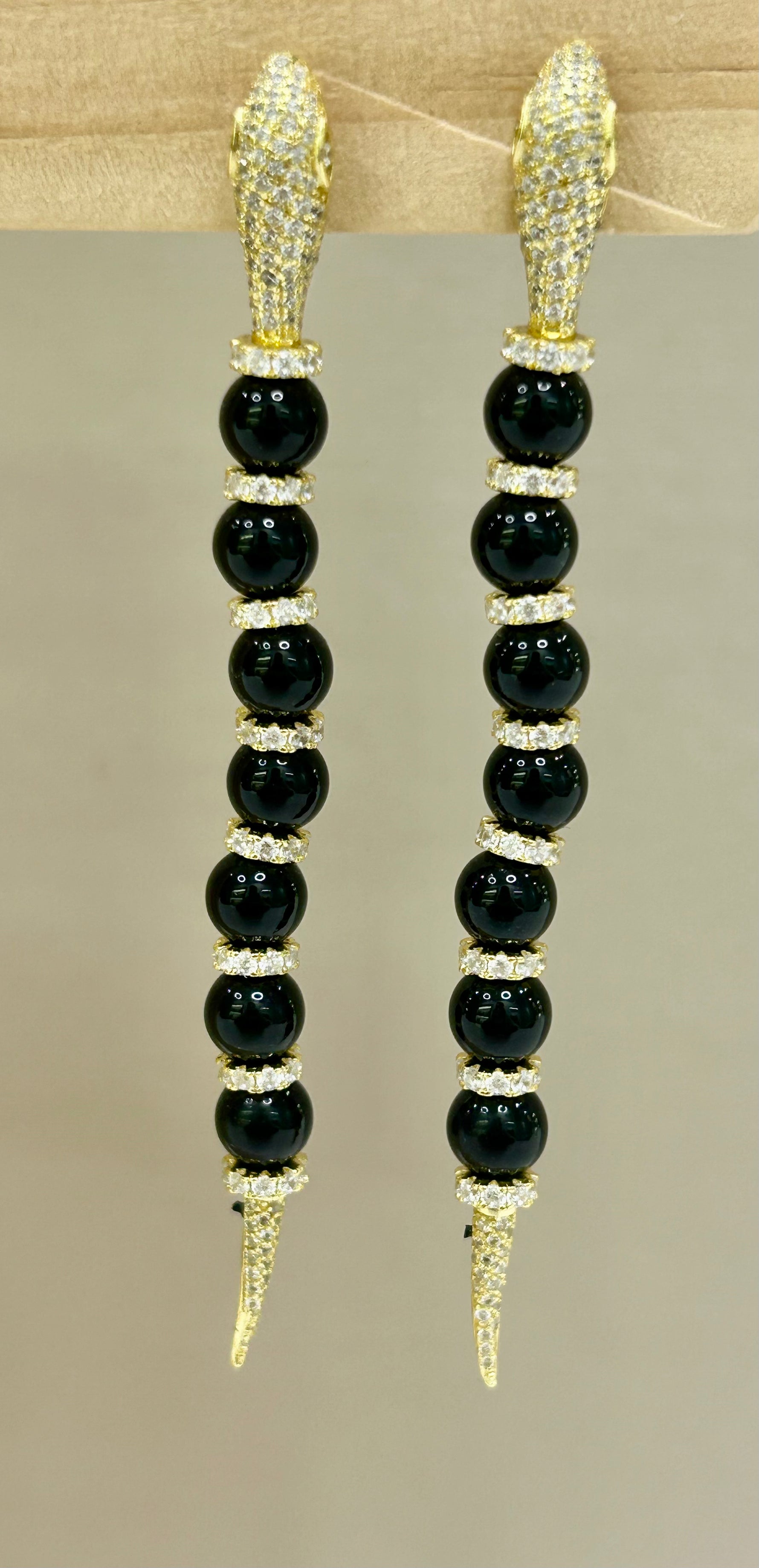 Orecchini modello Cartier in argento dorato 925% e onice nero