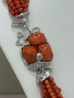 Collana torchon in corallo 7 fili e chiusura realizzata a mano in argento 925%