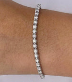 BRACCIALE TENNIS,MONTATURA A GRIFFE CON DIAMANTI TAGLIO BRILLANTI ct.2.00 COLORE G VS1 GRAMMI 7,30 IN ORO 18KT DIVERSE CARATURE
