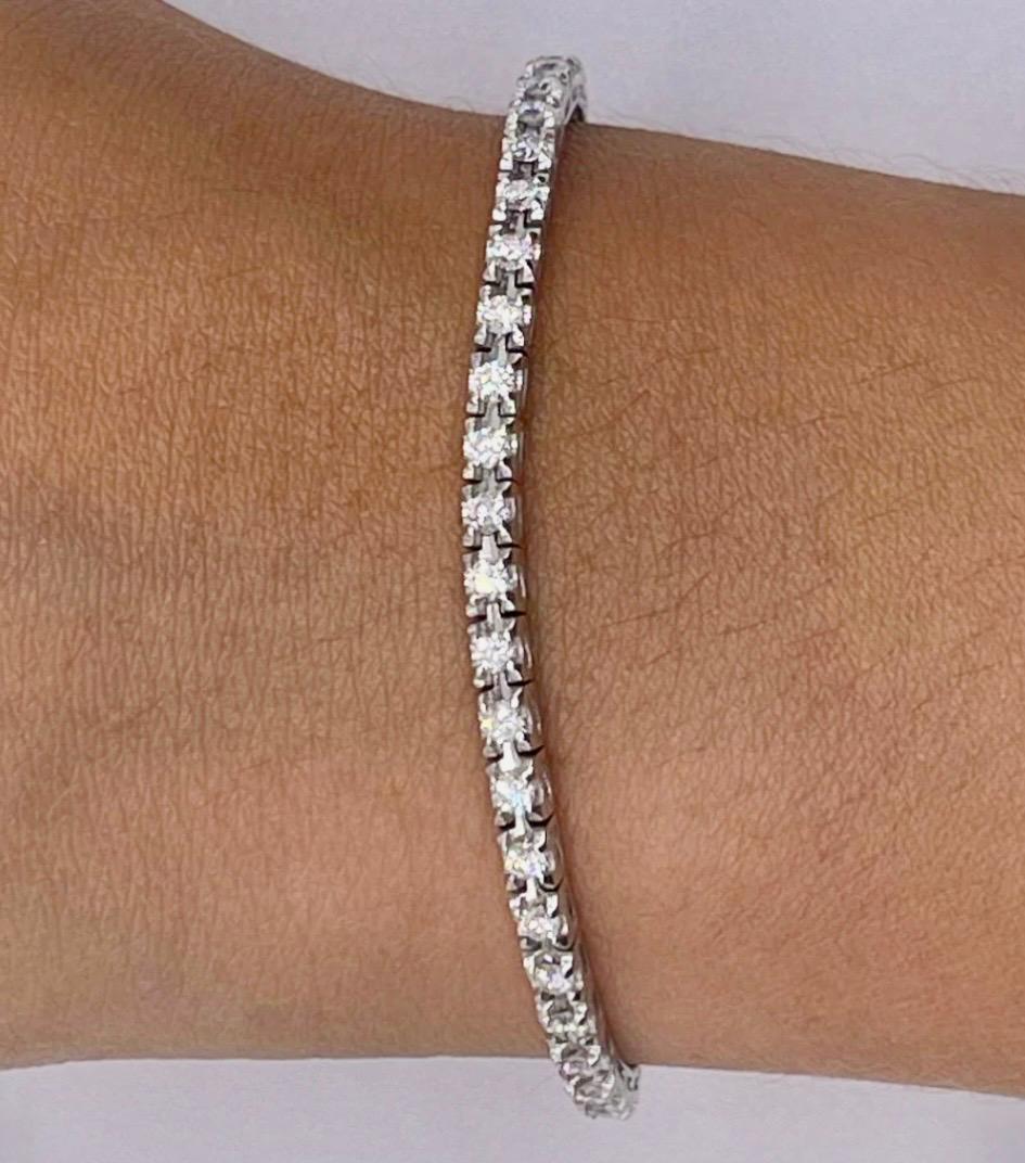 BRACCIALE TENNIS,MONTATURA A GRIFFE CON DIAMANTI TAGLIO BRILLANTI ct.2.00 COLORE G VS1 GRAMMI 7,30 IN ORO 18KT DIVERSE CARATURE
