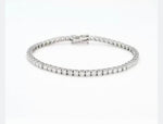 BRACCIALE TENNIS,MONTATURA A GRIFFE CON DIAMANTI TAGLIO BRILLANTI ct.2.00 COLORE G VS1 GRAMMI 7,30 IN ORO 18KT DIVERSE CARATURE